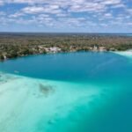 Located in Quintana Roo, Mexico, Bacalar Lagoon is a stunning freshwater paradise that’s often called the “Lagoon of Seven Colors” because of its vibrant, crystal-clear waters