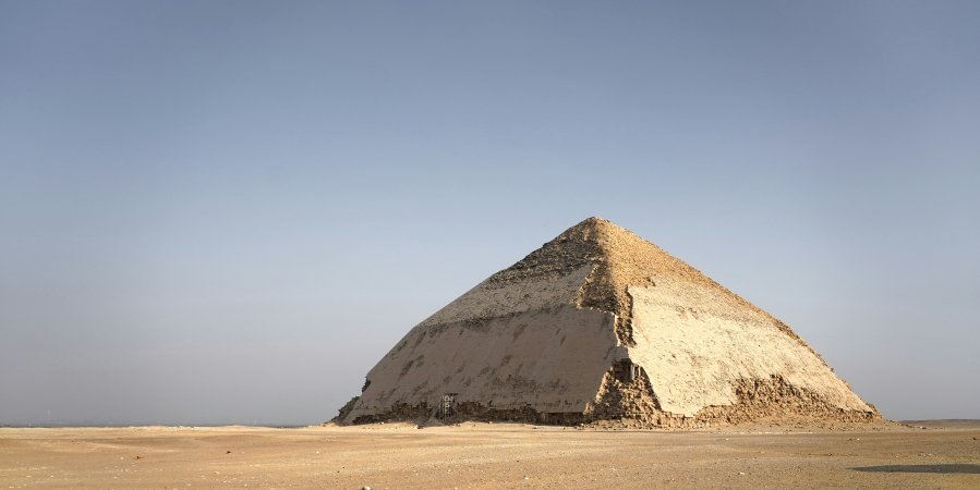 Bent Pyramid is located in Dahshur, part of the royal necropolis, and was built during the reign of Pharaoh Sneferu around 2600 BC