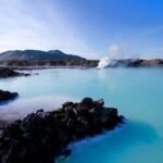 Just outside Reykjavík, the Blue Lagoon is one of Iceland's most iconic and luxurious destinations. Imagine soaking in warm, mineral-rich waters surrounded by dramatic volcanic landscapes—a perfect blend of relaxation and natural wonder