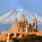 The Iglesia de Nuestra Señora de los Remedios in Cholula, Mexico, is a striking blend of history, spirituality, and breathtaking views.