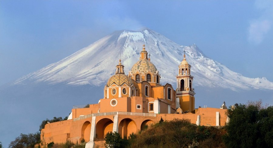 The Iglesia de Nuestra Señora de los Remedios in Cholula, Mexico, is a striking blend of history, spirituality, and breathtaking views.