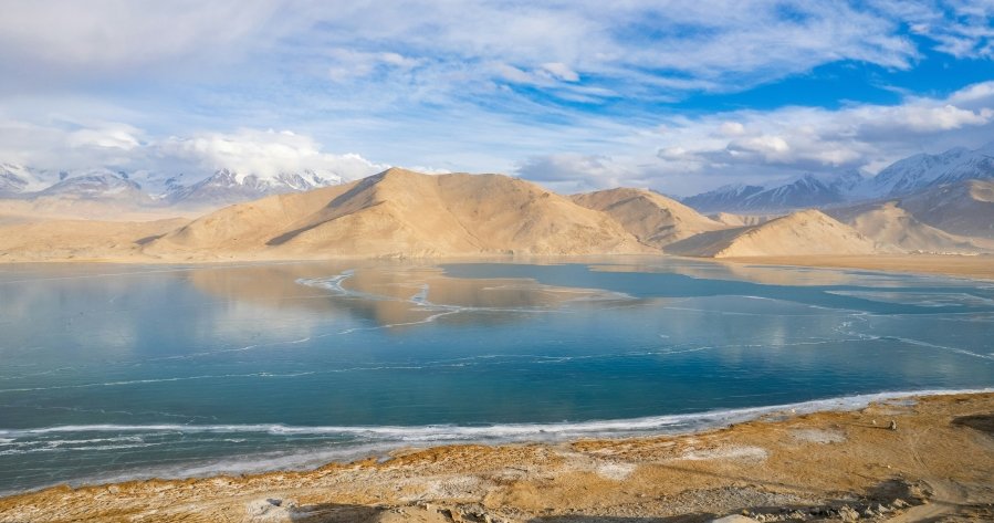 Located high in the Pamir Mountains, Karakul Lake in Xinjiang, China, is an awe-inspiring destination that feels like something out of a dream.