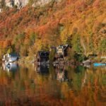 Lake Willoughby is a hidden treasure, especially in the autumn months when the landscape transforms into a vibrant tapestry of reds, oranges, and yellows.