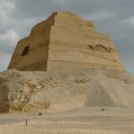 ocated in the sands of Lower Egypt lies the fascinating Meidum Pyramid, a lesser-known gem in the shadow of the more famous pyramids at Giza.