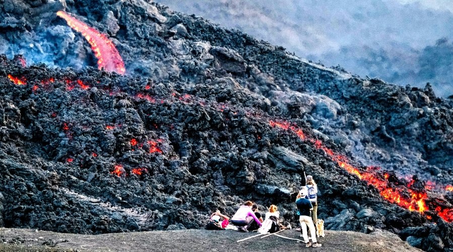 Pacaya Volcano located near Antigua, Guatemala, where you can roast marshmallows over volcanic steam vents and enjoy the thrill of being up close to one of Central America's most iconic natural wonders.