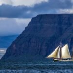Iceland’s fjords are a natural wonder that formed millions of years ago during the Ice Age when glaciers carved deep, narrow inlets into the rugged coastline.