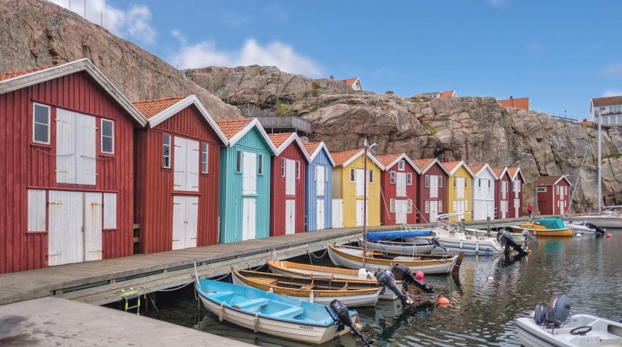 the picturesque town of Smögen is famous for its colorful boathouses that line the waterfront. These vibrant, charming structures add a burst of life to the rocky coastline