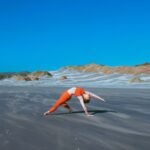 Wharariki Beach, a hidden gem at the northernmost point of New Zealand’s South Island. This untouched paradise is the perfect place for a yoga and meditation retreat,
