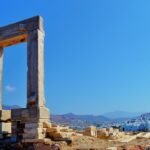 Located on a small islet connected to the main island of Naxos, the Portara, also known as the Temple of Apollo, is one of the most iconic landmarks in Greece.