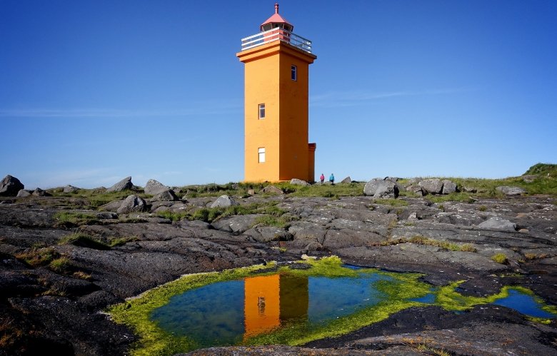 Stafnes Lighthouse is a hidden gem in Iceland that offers both charm and isolation. Painted in a striking color