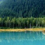 Blue Lake is a breathtaking retreat for nature lovers and adventure seekers alike. Its crystal-clear waters, surrounded by towering mountains and lush forests